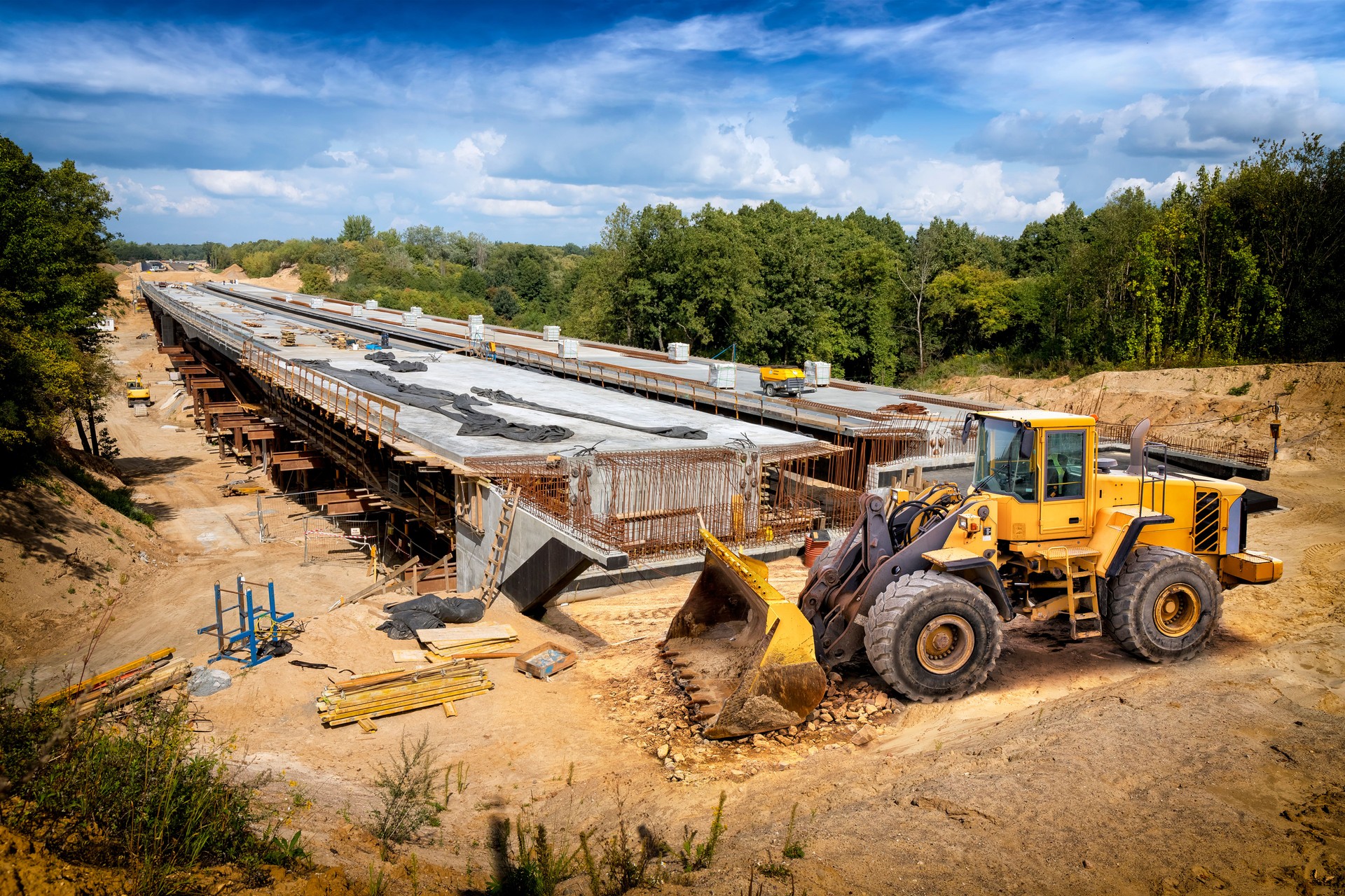 Earth mover on construction of the viaduct on the new S7 highway, Poland